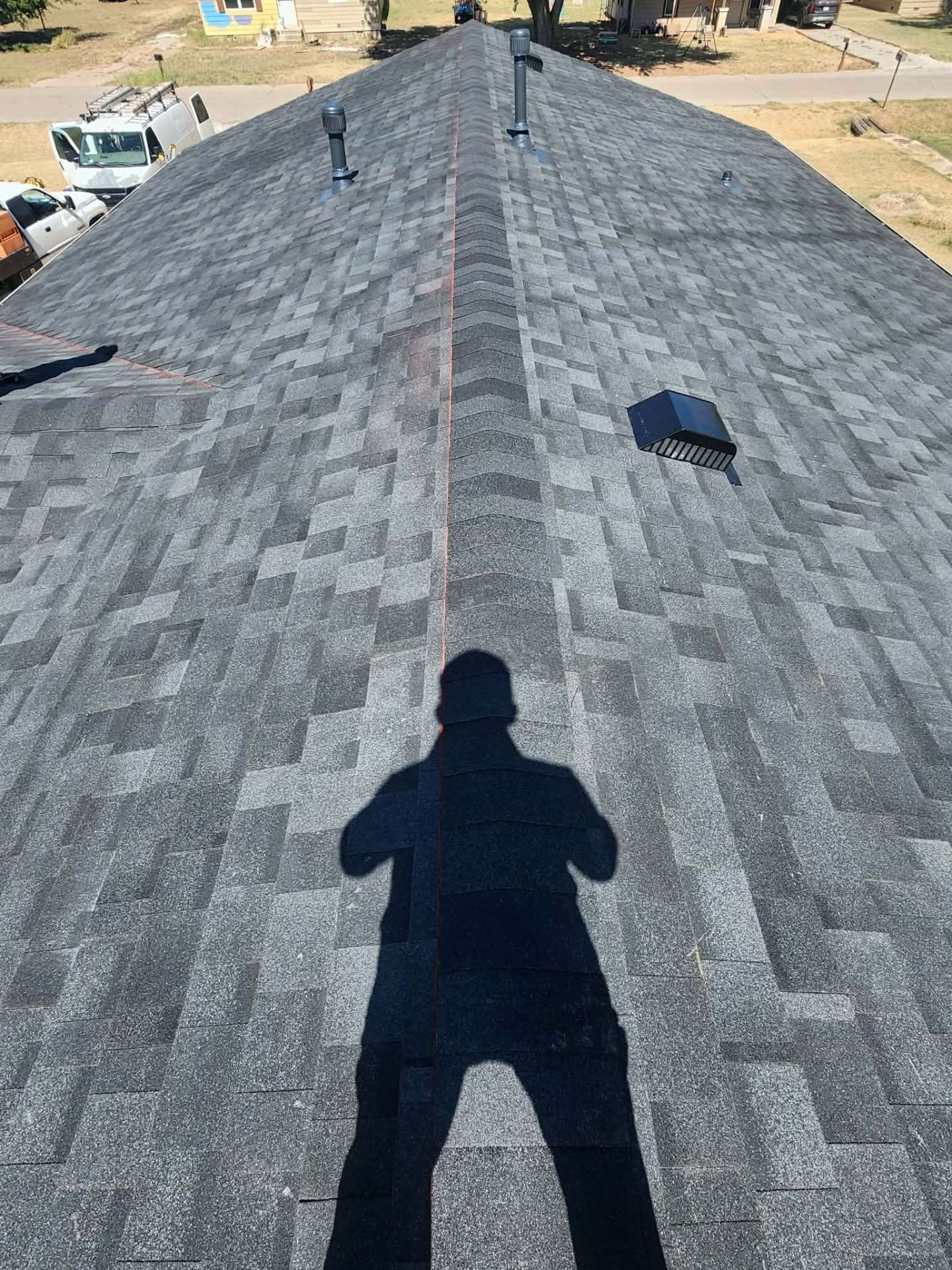 Finished architectural shingle roof — clean ridge line